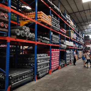 Adjustable carpet and fabric roll storage rack for cold rooms and industrial logistics