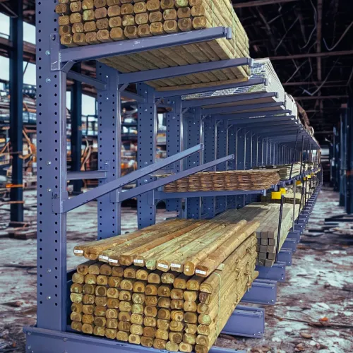 Adjustable arm racking for long material and industrial pipe handling